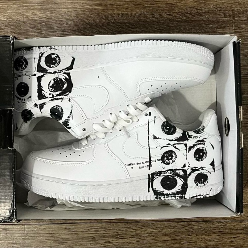 White Nike Air Force 1 shoes